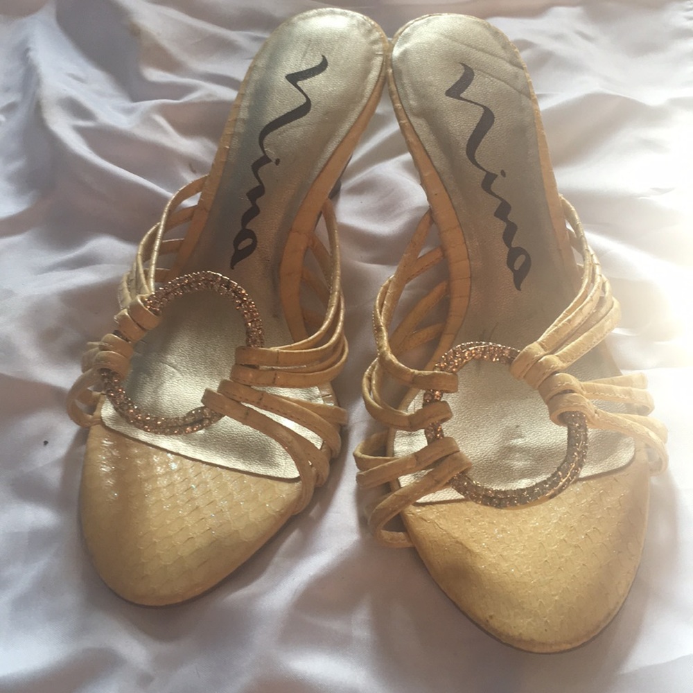 Yellow embellished sandals by Nina